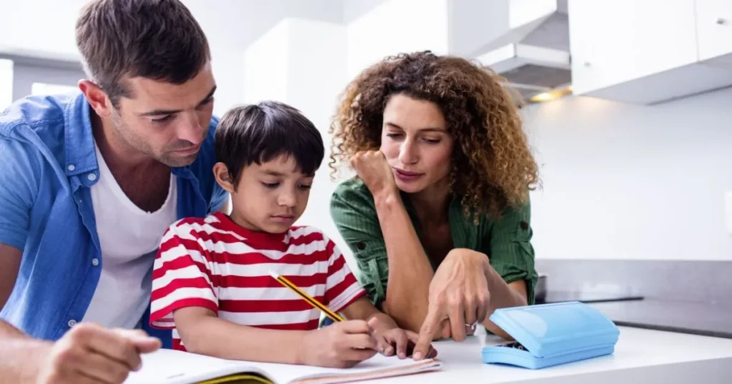Parents and child studying together for success in school