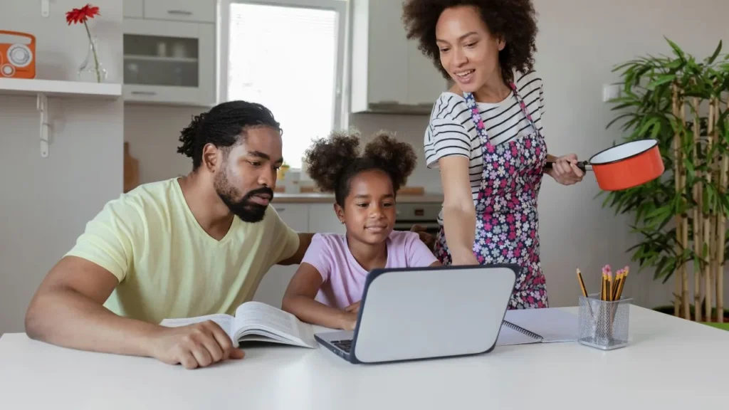 Parents teach their child from home through online education