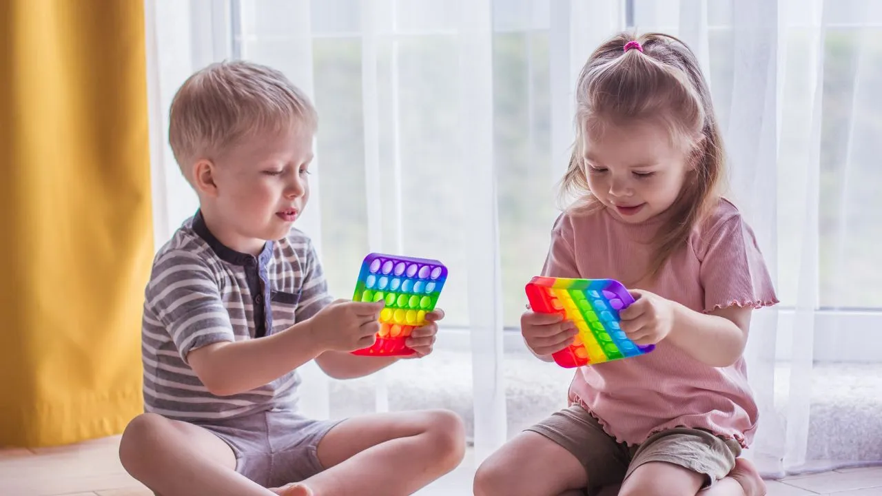 Kids playing with sensory toys